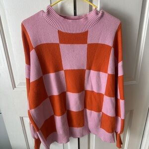 Pink and Orange Checkered Turtleneck Sweater